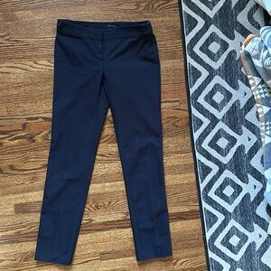 00Ann Taylor navy slacks with seam down the back.